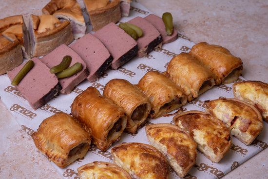 Classic savoury selection platter for six with pork pie pate sausage rolls and quiche

