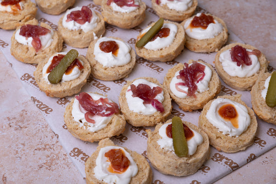 Ready to serve savoury cheese scone catering platter with whipped feta and homemade chutneys
