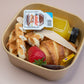 Individual brunch box with croissant, waffle, Nutella, and orange juice – breakfast catering delivery Manchester